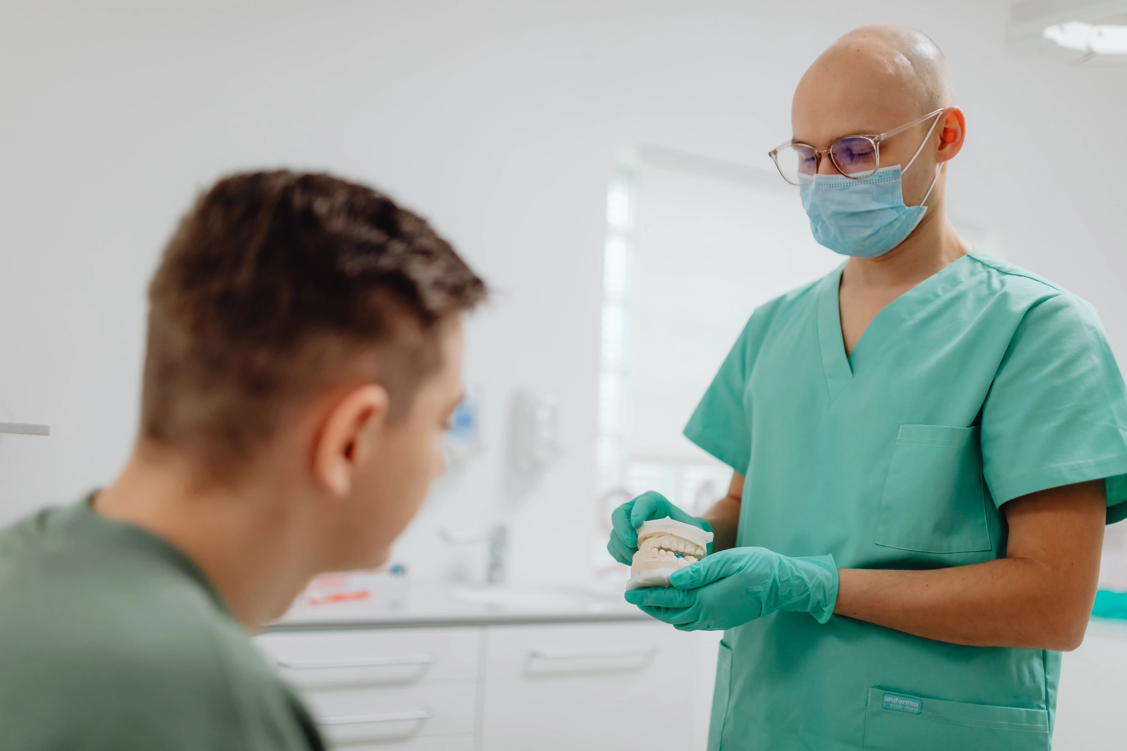 Dentist reviewing treatment with a patient